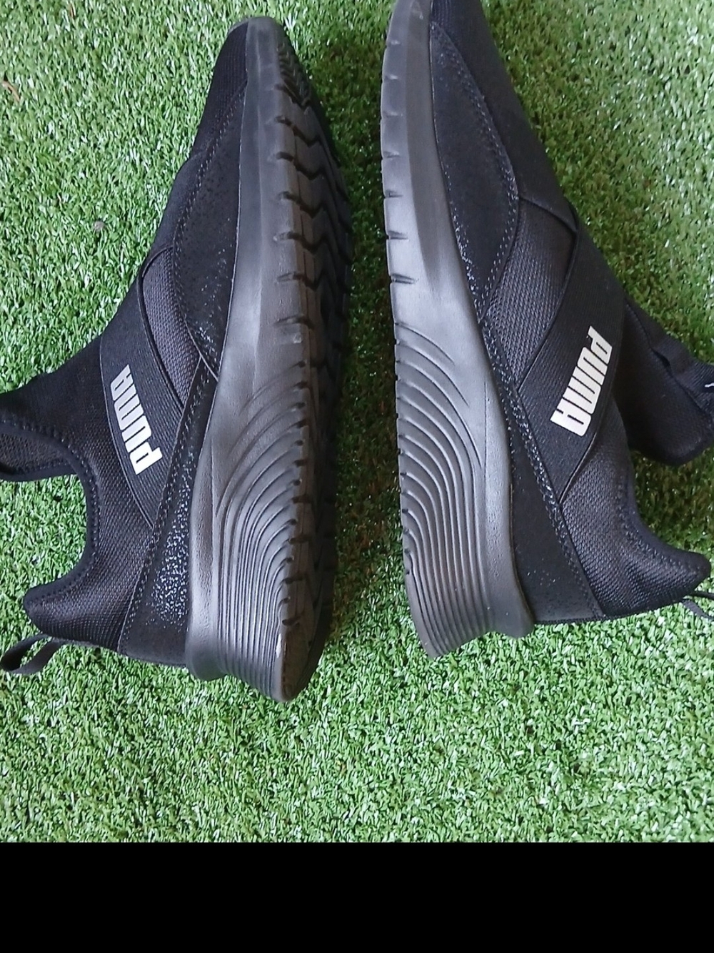 Puma Women's Black Athletic Slip-On Sneakers with White Logo